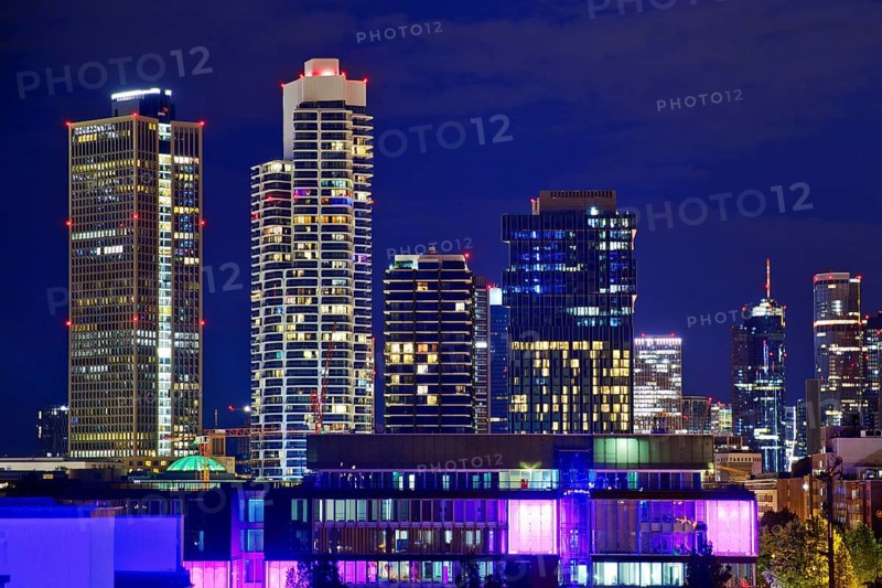 Rooftop day with colourfully illuminated houses for a techno party on the roof with a view of the skyline, Frankfurt am Main, Hesse, Germany