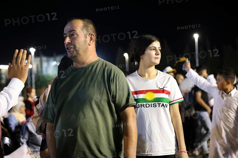 Young Kurdish woman visiting the first Damascus International Fair after Assad's fall, Damascus, Damascus, Syria