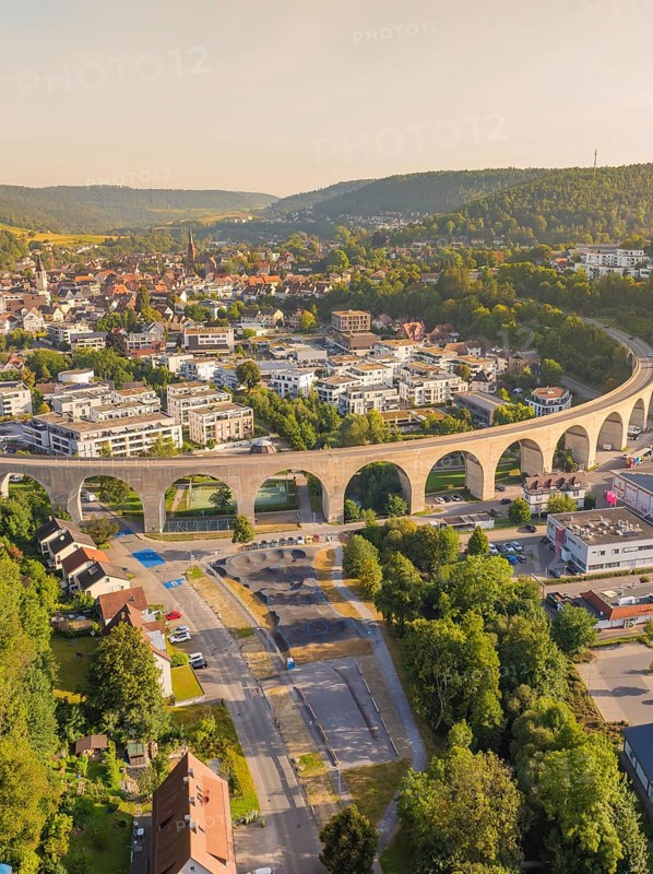 Viaduct running through an urban area over hills and through natural landscape, small town of Perle Nagold, Black Forest, Germany