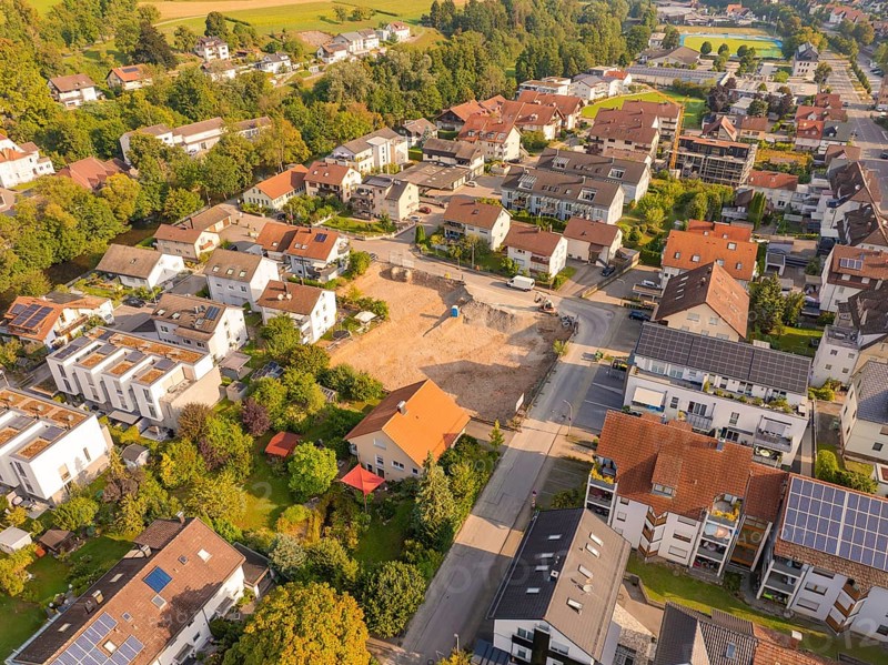 Quiet residential area with newly built area, surrounded by greenery and solar panels, small town pearl Nagold, Black Forest, Germany
