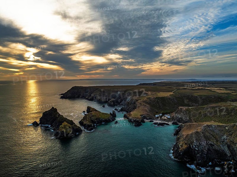 Sunset over Kynance Cove from a drone, Mount's Bay, Lizard Point, Cornwall, England, United Kingdom