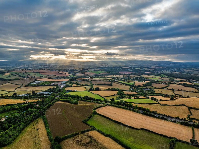 Sunset of Fields and Farms over Devon from drone, Torquay, Torbay, Devon, England, United Kingdom