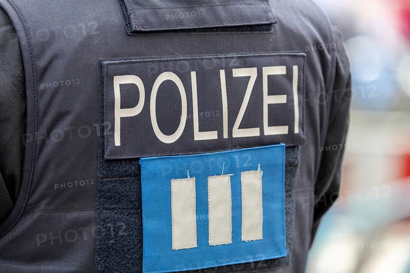 Symbolic image police operation: close-up of a police officer on duty
