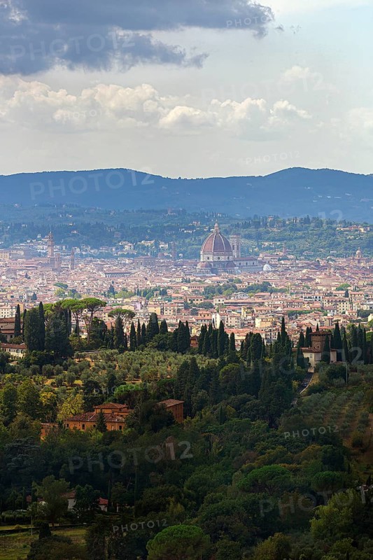 Panoramic view of the city of Florence with dome amidst Tuscan hills in Italy