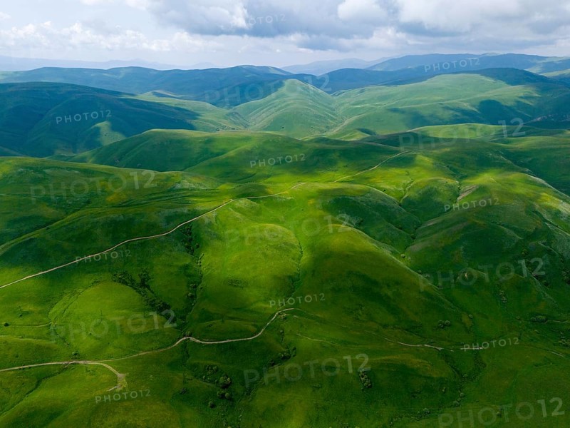 Green hills stretch under a cloudy sky, picturesque landscape, aerial view, Dilijan National Park, Dilijan, Dilijan, Delijan, Delijan, Tavush province, Tavush, Tavush, Armenia