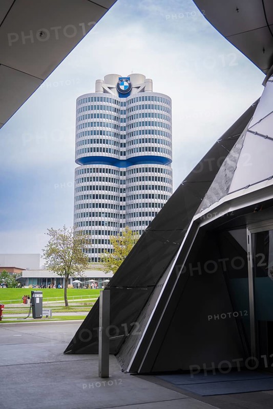 Striking high-rise building in modern architecture, perspective shot through entrance area, BMW Welt, Munich, Germany