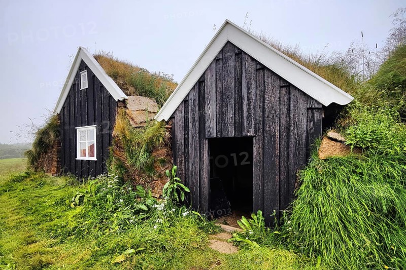 Nyibær, a medium-sized farmhouse with a sod roof, now a museum, Holar, Iceland