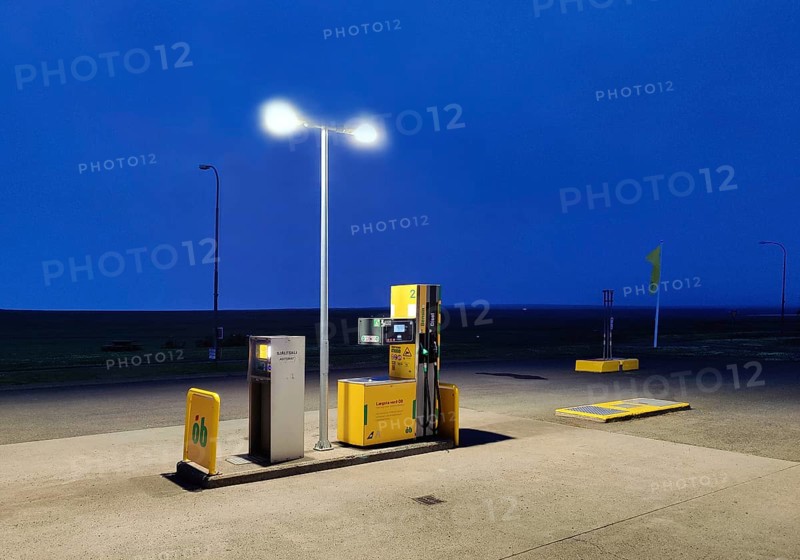 Petrol station vending machine with self-service day and night in rural surroundings in the evening, Laugarbakki, Northwest Iceland, Iceland
