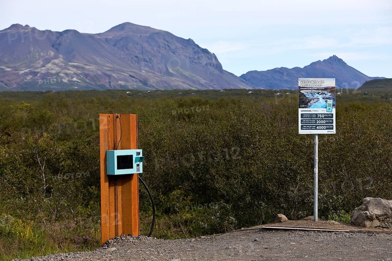Car park at Brúarfoss waterfall with EC machines for paying in the countryside, South Iceland, Iceland