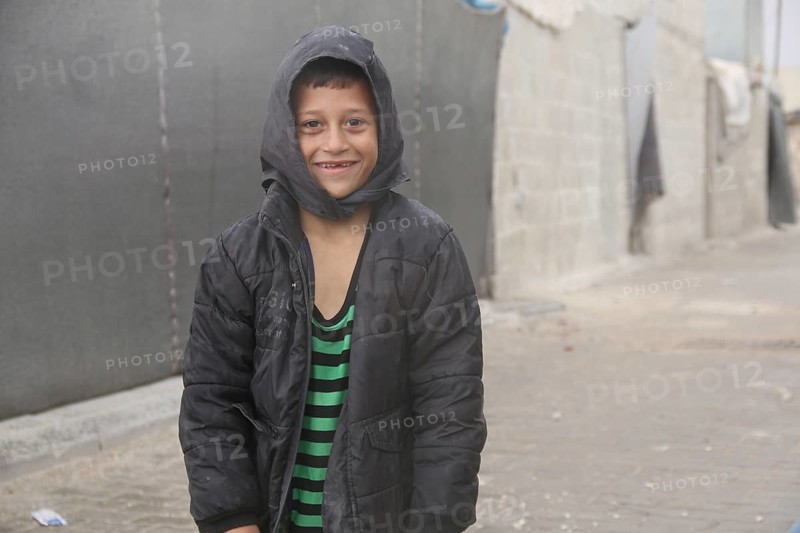 Syrian children playing in a refugee camp near the Turkish border on World Children's Day. Aleppo, Syria March 2, 2017, Aleppo, Syria