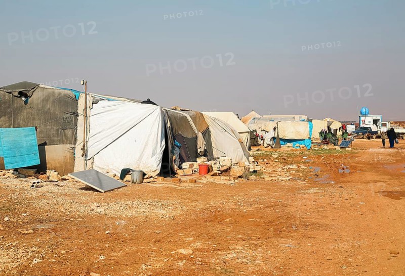 Worn-out tents housing Syrian refugees near the Turkish border, showing the dire humanitarian conditions in which displaced people are forced to live. Aleppo, Syria. January 26, 2023, Aleppo, Syria