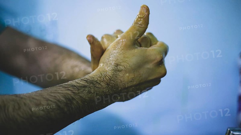 A doctor washing his hands before entering the operating room to perform surgery. Aleppo, Syria October 18, 2022, Aleppo, Syria
