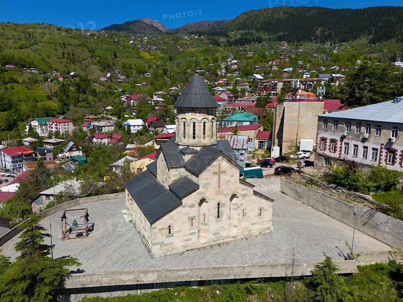 Church in a small mountain village with traditional architecture and green, picturesque surroundings, aerial view, Andrew Apostol Church, Khulo, Chulo, Autonomous Republic of Adjara, Adjara, Lesser Caucasus, Georgia