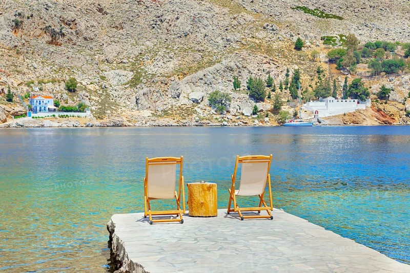 Path leading to the turquoise waters of Nimborio Beach, Nimborio, Symi Island, Dodecanese Islands, Greece