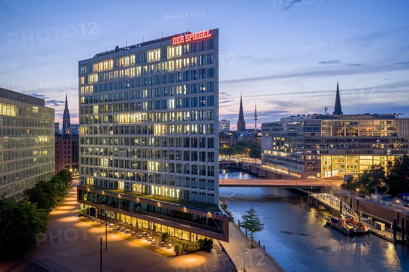 Aerial view of the Spiegel building at Ericusspitze in Hamburg's HafenCity in the Brooktorkai neighbourhood at blue hour, Hamburg, Germany