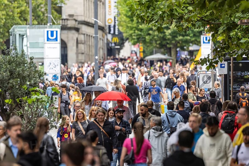 Crowd on the way in the shopping street. Königstraße pedestrian zone in Stuttgart, Baden-Württemberg, Germany