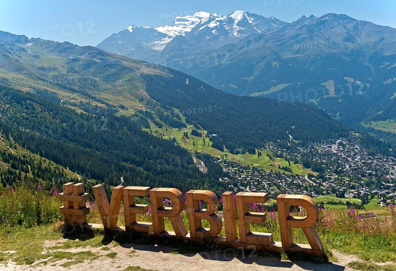 Lettering 'Verbier' in large wooden letters at a photo spot on the Col de la Croix de Cœur pass, Verbier, Valais, Switzerland