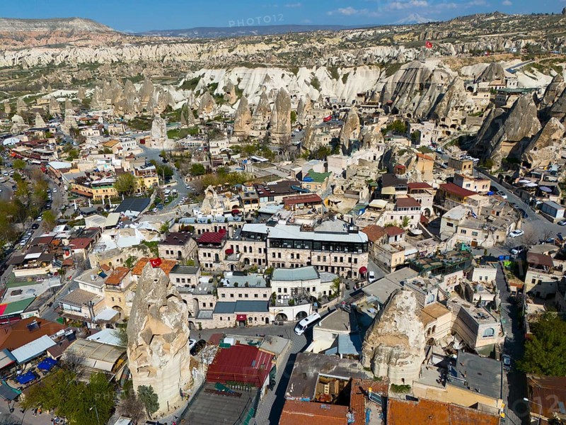 Cityscape in Cappadocia with numerous buildings and characteristic rock formations, aerial view, Göreme, Göreme National Park, Göreme Tarihî Millî Parki, Nevsehir Province, Nevsehir, Cappadocia, Cappadocia, Cappadocia, Cappadocia, Central Anatolia, Turkey