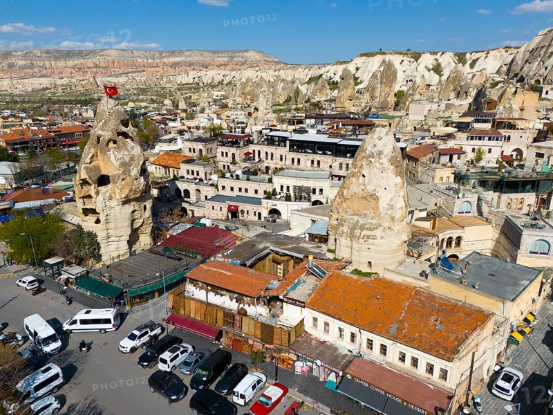 Historical buildings in combination with impressive rock formations with an urban backdrop, aerial view, Göreme, Göreme National Park, Göreme Tarihî Millî Parki, Nevsehir Province, Nevsehir, Cappadocia, Cappadocia, Cappadocia, Cappadocia, Central Anatolia, Turkey