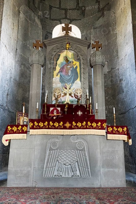 Church altar with religious symbols and icon, decorated with red cloths and candles, Sisian, Sissian, Sjunik province, historically Sangesur, Armenia