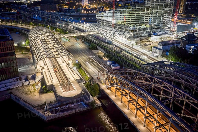 Blue hour aerial view of the Hamburg Elbbrücken U4 underground and suburban railway station and the Elbtower construction site, Hamburg, Germany