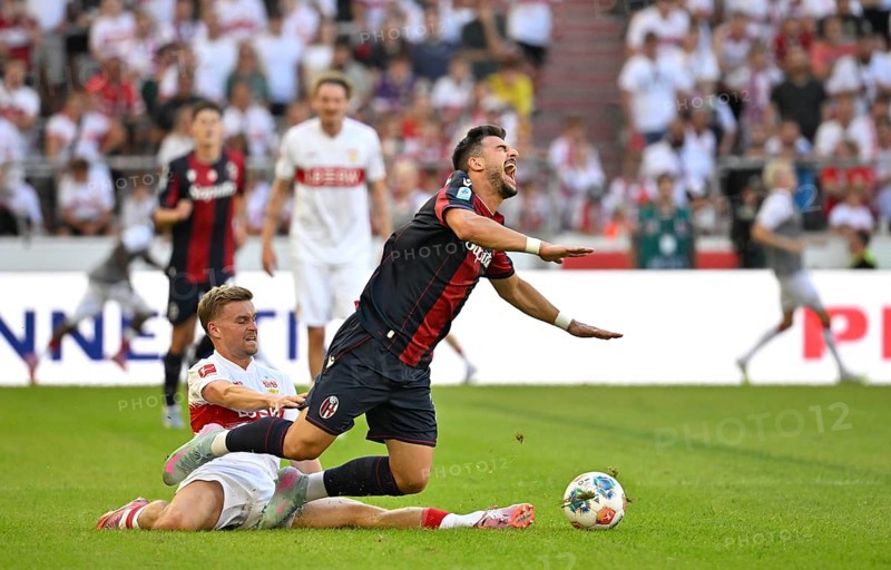 Tackle, action foul Maximilian Mittelstaedt VfB Stuttgart (07) v Riccardo Orsolini FC Bologna (07) MHPArena, MHP Arena Stuttgart, Baden-Württemberg, Germany