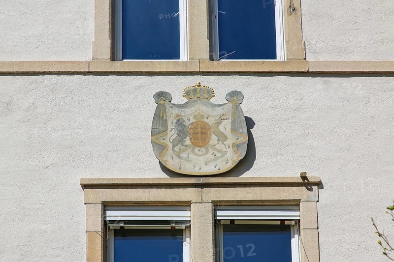 Coat of arms, detail, outbuilding, house, stud farm near the Lauterquelle, Offenhausen, municipality of Gomadingen, Swabian Alb, Baden-Württemberg, Germany