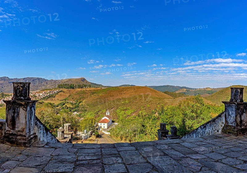 Old stone buildings and a church on the hills of the city of Ouro Preto in Minas Gerais, Ouro Preto, Minas Gerais, Brazil