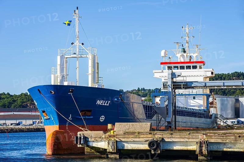 Industrial harbour structures and cargo ship NELLI in the port of Uddevalla, Bohuslän, Västra Götalands län, Sweden, for editorial use only