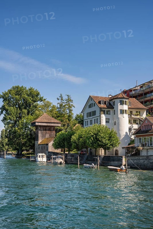 The banks of the Rhine in Diessenhofen with the historic wooden Hänkiturm tower, Canton Thurgau, Switzerland