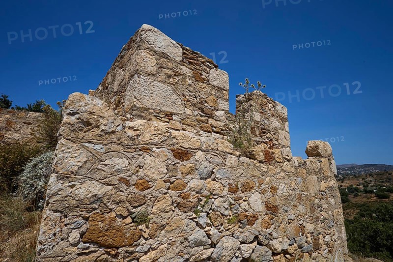 Old stone ruins in a Mediterranean landscape under a clear sky with sparse vegetation, Panagia tou Paleokastro, Church of the Old Fortress, Chapel, Panagia Kasteli, Lepides, Leros, Dodecanese, Greek Islands, Greece