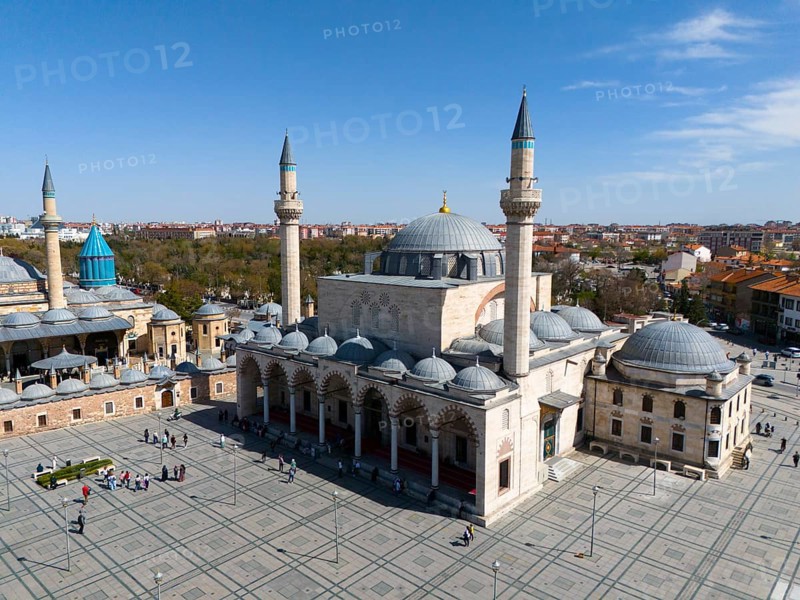 Spacious mosque complex with wide squares and several minarets under a clear sky, aerial view, Mevlânâ Museum, Mevlana, landmark, mausoleum of Mevlânâ Dschalal ad-Din Rumi, Konya Sultan Selim Camii, Konya, Central Anatolia, Turkey