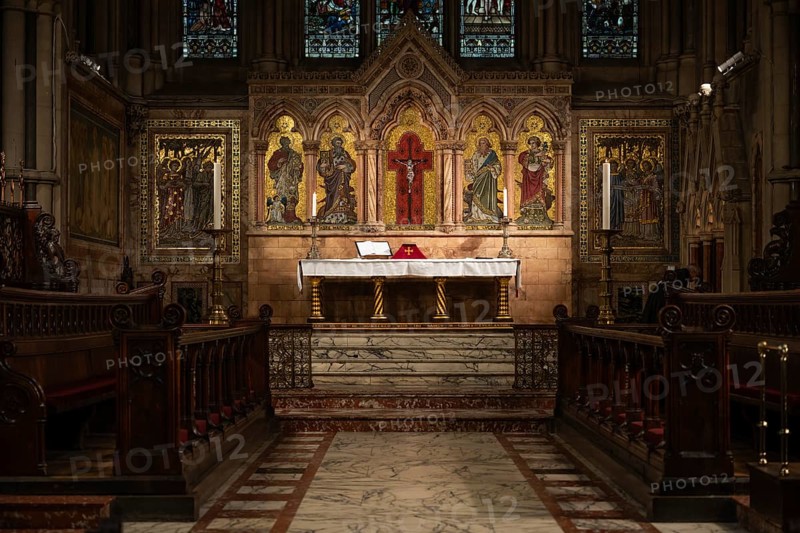 Detailed church altar surrounded by candles, St Mary Abbot Church, Kensington, London, England, Great Britain