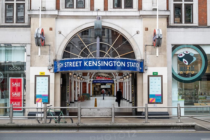 Entrance to High Street Kensington underground station in an urban environment, Kensington, London, England, United Kingdom