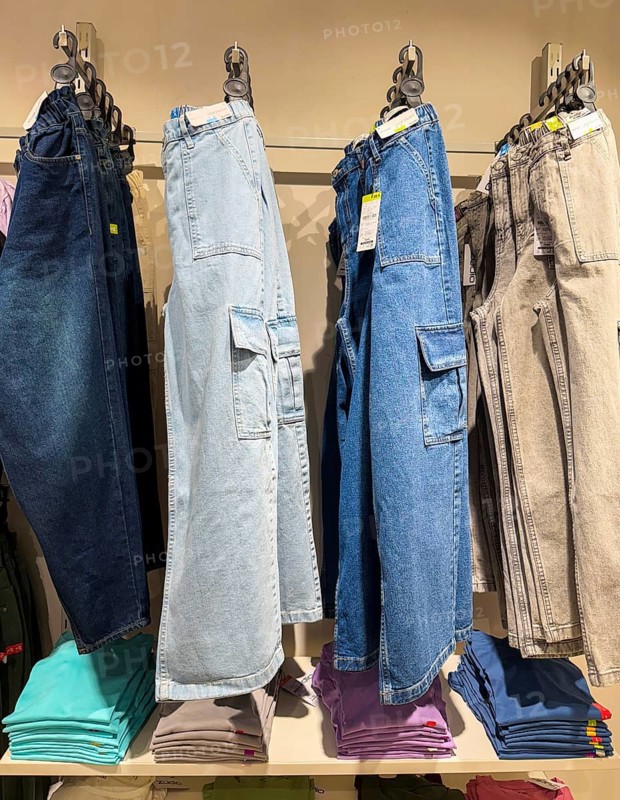 Jeans display at Zudio store in Guwahati, India, during a monsoon season sale on August 1, 2025