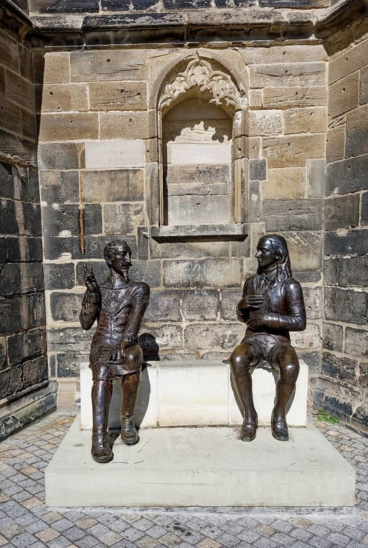 Bronze figures of Heinrich Schütz and Friedrich von Hardenberg alias Novalis by the artists Grit Bergner and Steffen Ahrens at the Protestant late Gothic St. Mary's Church, town church, market square, Weißenfels, Saxony-Anhalt, Germany