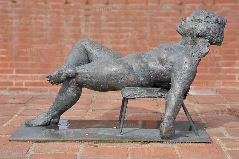Sculpture Reclining Sofia by Bärbel Dieckmann 1991, bronze sculpture, modern art, female figure, deckchair, relax, rest, resting, resting, holiday, recreation, leisure, satisfaction, joy, enjoy, sunbathing, sunbathing, symbol, Marienkirchturm, Wismar, Mecklenburg-Vorpommern, Germany
