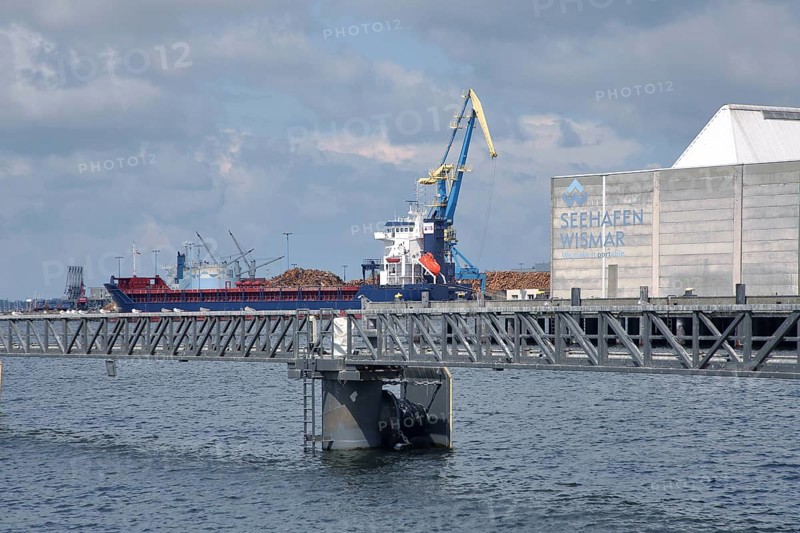 Seaport with pier and jetty, harbour crane, gantry crane, container crane, shipyard crane, cargo crane, industry, cargo ship, inscription, harbour, Wismar, Mecklenburg-Western Pomerania, Germany