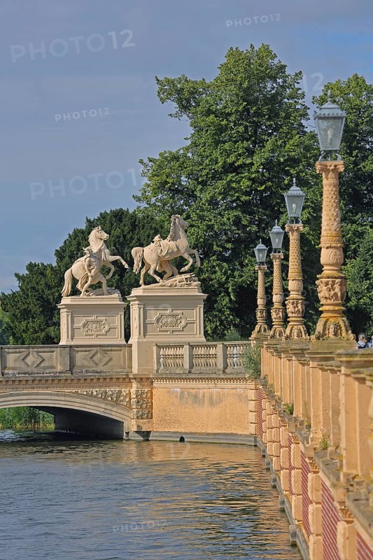 Castle bridge with two horse figures, castle lake, street lamps, shore, balustrade, Schwerin, Mecklenburg-Western Pomerania, Germany