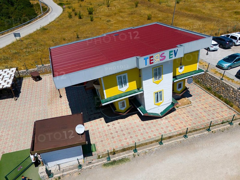 Building with car park against a rural backdrop, aerial view, Ters Ev, upside down house, Safranbolu, Karabük province, Central Anatolia, Turkey