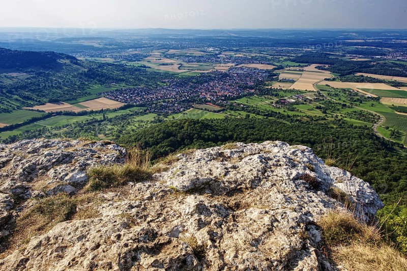 View from the Breitenstein rock plateau over extensive fields and villages as far as the horizon, Bissingen an der Teck, Baden-Württemberg