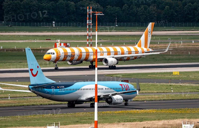 Düsseldorf Airport, Condor Airbus on take-off, TUIFly Boeing 737 on the way to take-off, North Rhine-Westphalia, Germany