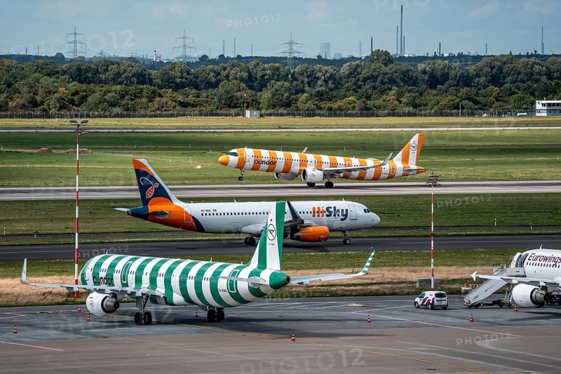 Düsseldorf Airport, Condor Airbus A321-200, aircraft on the apron, Condor Airbus A321-271NX on take-off, HiSky Europe Airbus A320-200 on the taxiway for take-off, North Rhine-Westphalia, Germany