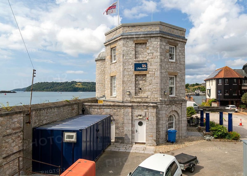 Historic RNLI lifeboat station building, Old Custom House, Millbank marina village, Plymouth, Devon, England, UK