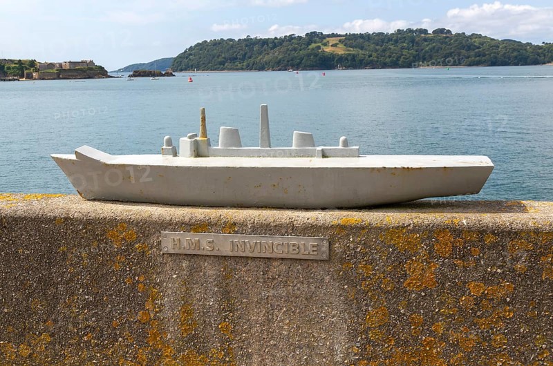 Steel model of HMS Invincible navy ship on seafront wall, city of Plymouth, Devon, England, UK
