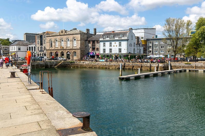 People sitting outside The Three Crowns pub quayside harbour, The Barbican, Plymouth, Devon, England, UK