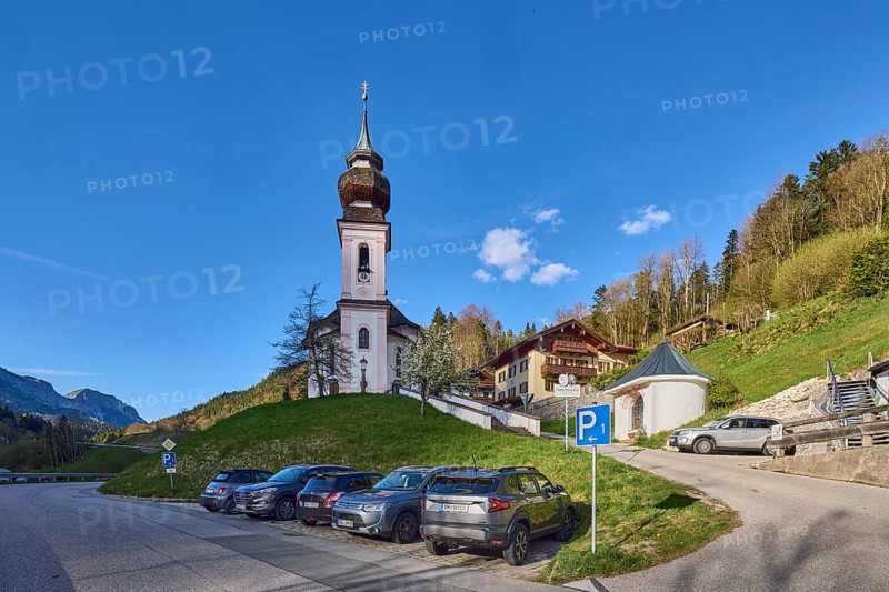 Maria Gern pilgrimage church, church, mountain landscape, hills, mountains, coniferous forest, road, parking boxes, vehicles, shadow, blue sky, cumulus clouds, intersection of Gerner Straße with Gern church square, Maria Gern district, Berchtesgaden, Upper Bavaria, Berchtesgadener Land district, Bavaria, Germany