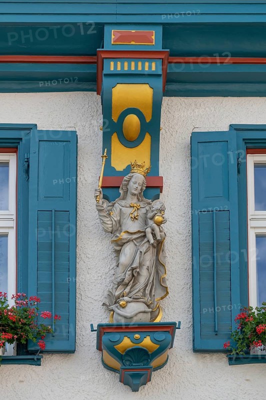 Statue of the Virgin Mary on a house, Biberach an der Riß, Baden-Württemberg, Germany