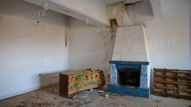 Lost Place, Apitiki, Military post, An empty room with a fireplace and neglected furniture, Photos related to WW2, Battle of Leros, Leros, Dodecanese, Greek Islands, Greece