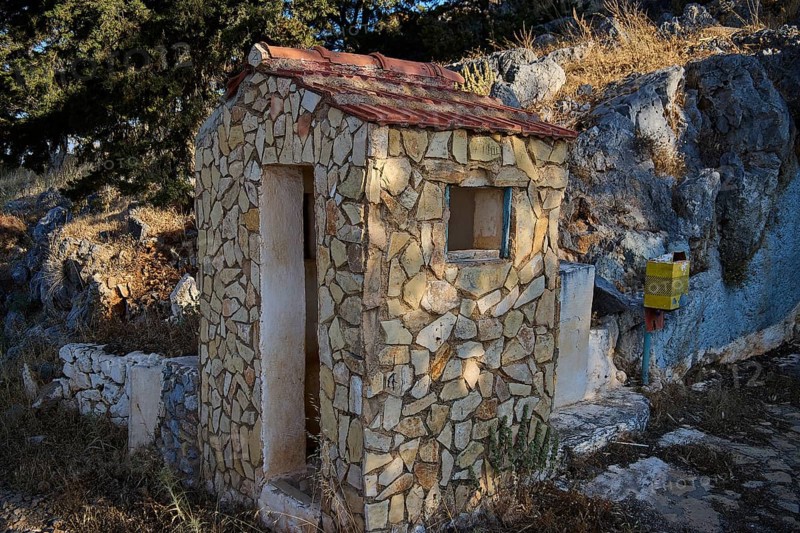 Apitiki, Lost Place, Bunker, Guardhouse, Small stone hut next to rocks, surrounded by dry grass and trees, rustic atmosphere, photos related to WW2, Battle of Leros, Leros, Dodecanese, Greek Islands, Greece